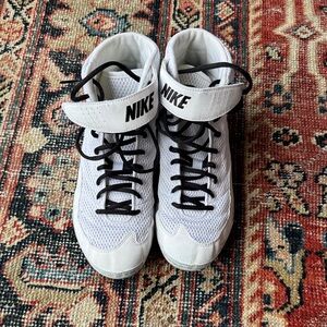 Nike White and Black wrestling shoes.  Barely worn size 10.  Great condition.